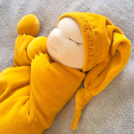 Lapse esimene nukk, Une-Mati. Nimeline katsikukink